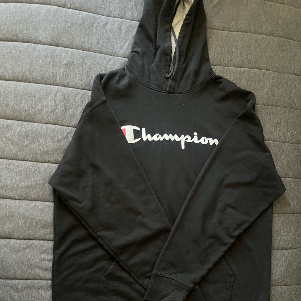 This is a black Champion hoodie